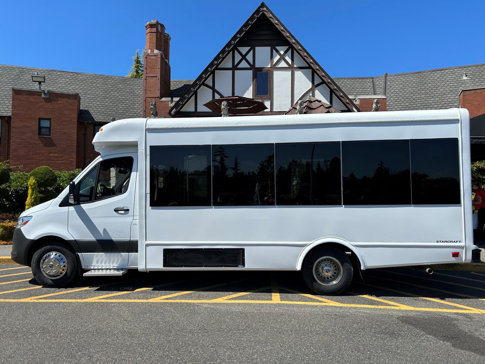 Coach bus in front of building